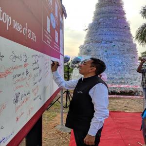 Shri Gopal Krishna IAS, Secretary (Shipping), Govt of India joins the campaign by Cochin Port fraternity to stop use of Single Use Plastics (SUPs) by signing the message board placed near the SUP Christmas Tree at CoPT Walkway,Willingdon Island (24.12.19)